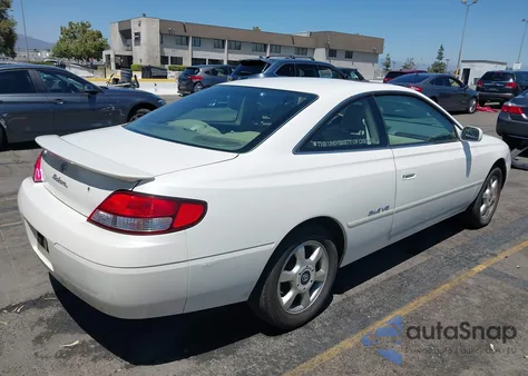 1999 Toyota Camry Solara Sle z USA, uszkodzony, nr VIN 2T1CF22P1XC210933